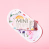 Mini Wildflowers MakeUp Eraser packaging on top of cloth.
