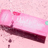 Original Pink MakeUp Eraser packaging being splashed with water. 