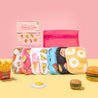 Foodie 7-Day Set box  next to Foodie 7-Day Set MakeUp Eraser cloths and laundry bag.