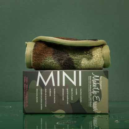 Rolled up Mini Camo MakeUp Eraser cloth on top of packaging.
