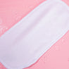 Clean White MakeUp Eraser laying flat surrounded by waterdrops.