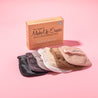 Neutral 7-Day Set MakeUp Eraser cloths laying flat next to packaging. 