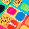 Eclectic 10-Day Set MakeUp Eraser cloths laying flat on colorful background. 