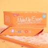 Two Juicy Orange MakeUp Eraser packages on top of a Juicy Orange MakeUp Eraser cloth.