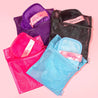 OG Pink, Queen Purple, Chic Black, and Chill Blue 7-Day Sets inside of their laundry bags.