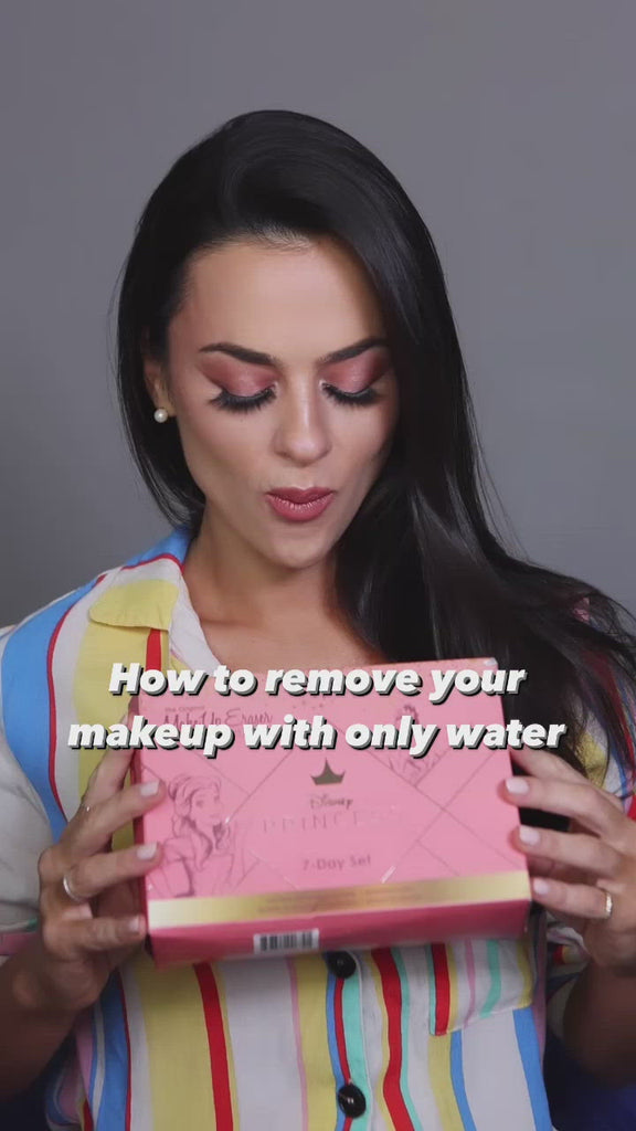 Video of woman removing makeup with Ultimate Disney Princess 7-Day Set MekUp Eraser cloths. 