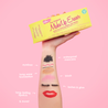 Hand holding Mellow Yellow MakeUp Eraser packaging. There is writing on the arm that calls out the various makeup that MakeUp Eraser can remove.