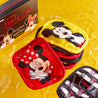 Mickey & Minnie 7-Day Set MakeUp Eraser cloths next to packaging surrounded by water. 