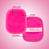 Front and back of Daily Pink MakeUp Eraser cloth. The front short fiber side is labeled as erase, and the back long fiber side is labeled as exfoliate.