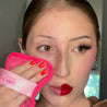 Woman removing makeup with OG Pink 7-Day Set MakeUp Eraser cloth. 