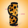 Rolled up Cheetah Print MakeUp Eraser with both sides exposed. The short fiber side is labeled as erase, and the long fiber side is labeled as exfoliate.